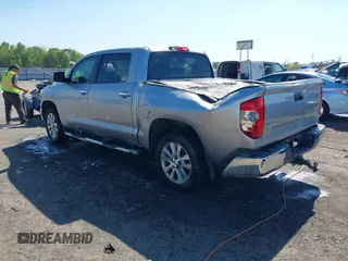 2014 Toyota Tundra 4WD Truck LTD with VIN 5TFHW5F17EX332059, listed as a IAAI auction lot 42030610 with 248,676 mi miles. Bid and sale history available at carsss.com. Image 3.