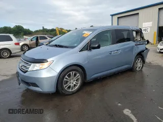 2013 Honda Odyssey EX-L with VIN 5FNRL5H6XDB052098, listed as a Copart auction lot 62516035 with 116,774 mi miles and Salvage title. Bid and sale history available at DreamBid. Image 1.