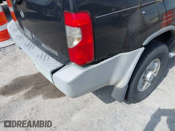 2000 Nissan Xterra XE with VIN 5N1ED28Y9YC604703, listed as a IAAI auction lot 42095801 with 250,603 mi miles. Bid and sale history available at carsss.com. Image 6.