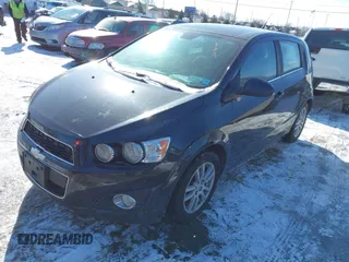 2013 Chevrolet Sonic LT with VIN 1G1JC6SG1D4250167, listed as a IAAI auction lot 41498238 with 66,750 mi miles. Bid and sale history available at carsss.com. Image 2.