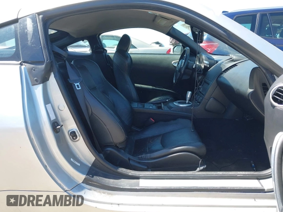 2005 Nissan 350Z Touring with VIN JN1AZ34E85M651414, listed as a IAAI auction lot 42078892 with 155,280 mi miles. Bid and sale history available at carsss.com. Image 5.