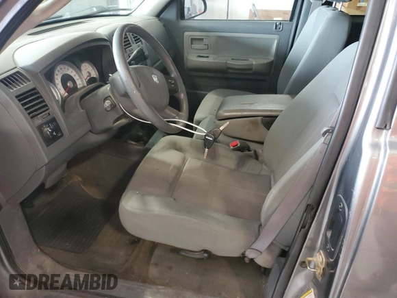 2005 Dodge Dakota SLT с VIN 1D7HW42N95S131964, выставлен на аукционе Copart как лот 53836925 с пробегом 117 094 миль миль и Списание • Salvage title. История ставок и продаж доступна на DreamBid. Изображение 7.