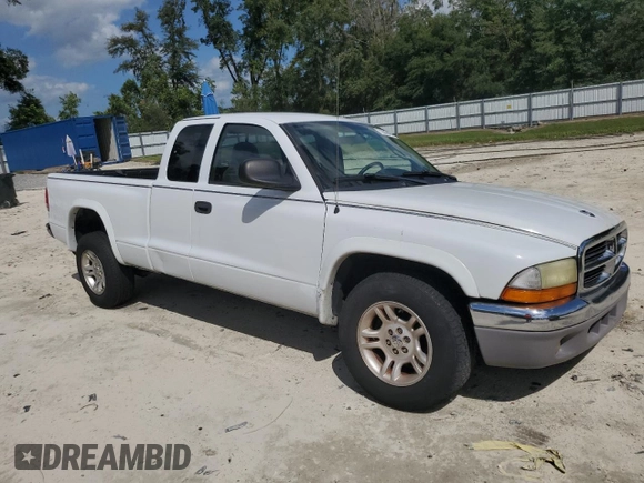 2003 Dodge Dakota SLT with VIN 1D7HL42XX3S333865, listed as a Copart auction lot 73509404 with 123,515 mi miles and Salvage Title. Bid and sale history available at carsss.com. Image 4.