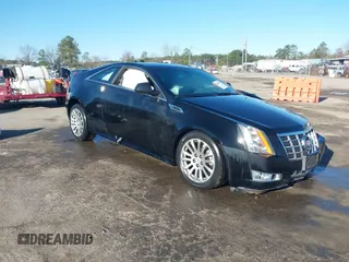 2014 Cadillac CTS Performance z VIN 1G6DG1E32E0107034, wystawiony jako IAAI lot #41807428 z przebiegiem 20 996 mil mil oraz . Historia ofert i sprzedaży dostępna na DreamBid. Obrazek 1.
