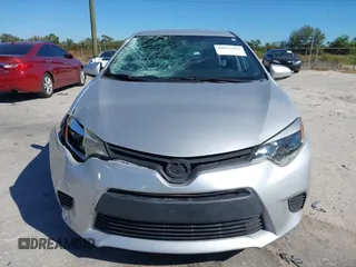 2014 Toyota Corolla L with VIN 2T1BURHE5EC006925, listed as a IAAI auction lot 40917569 with 130,761 mi miles and . Bid and sale history available at DreamBid. Image 12.