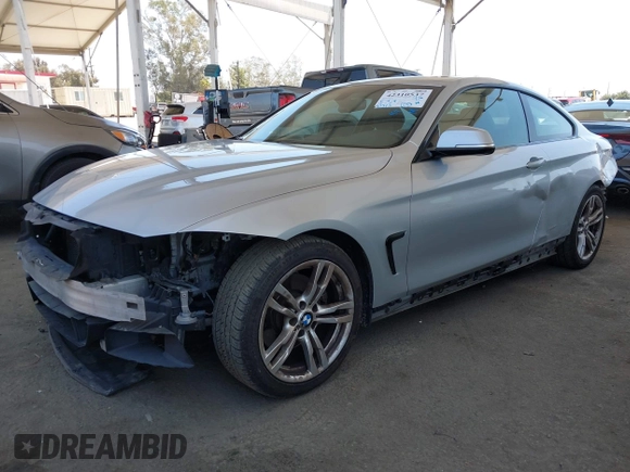 2014 BMW 4 Series 428i with VIN WBA3N7C58EF719514, listed as a IAAI auction lot 42310537 with 82,573 mi miles and . Bid and sale history available at DreamBid. Image 2.
