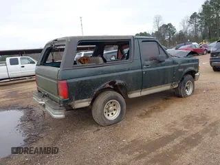 1996 Ford Bronco Custom with VIN 1FMEU15H4TLA86037, listed as a IAAI auction lot 41582668 with 1 mi miles. Bid and sale history available at carsss.com. Image 4.