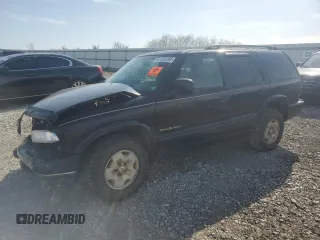 1999 Chevrolet Blazer Trailblazer z VIN 1GNDT13W3X2143268, wystawiony jako Copart lot #51333285 z przebiegiem Nie podano mil oraz Szkoda całkowita • Salvage title. Historia ofert i sprzedaży dostępna na DreamBid. Obrazek 1.
