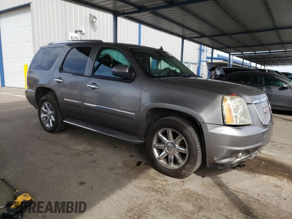 2012 GMC Yukon Denali with VIN 1GKS1EEFXCR236823, listed as a Copart auction lot 49830405 with 134,568 mi miles and Salvage Title. Bid and sale history available at carsss.com. Image 4.