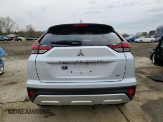 2024 Mitsubishi Eclipse Cross SE z VIN JA4ATWAA9RZ069181, wystawiony jako Copart lot #52674925 z przebiegiem 7522 mil mil oraz Szkody całkowita. Historia ofert i sprzedaży dostępna na DreamBid. Obrazek 6.
