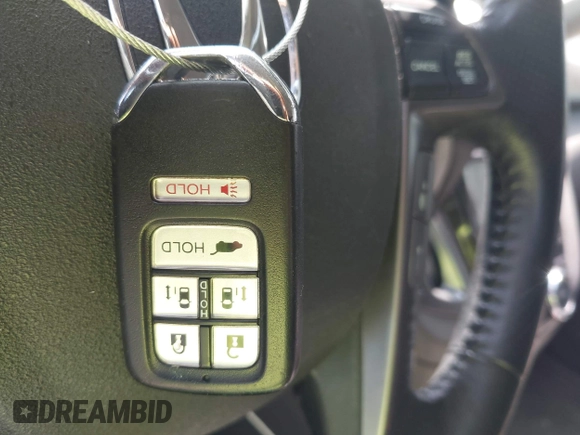 2014 Honda Odyssey Touring with VIN 5FNRL5H99EB075979, listed as a IAAI auction lot 42520154 with 99,314 mi miles and . Bid and sale history available at DreamBid. Image 11.