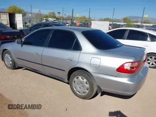 1999 Honda Accord LX z VIN JHMCG5648XC803856, wystawiony jako IAAI lot #42063037 z przebiegiem 254 421 mil mil oraz . Historia ofert i sprzedaży dostępna na DreamBid. Obrazek 3.