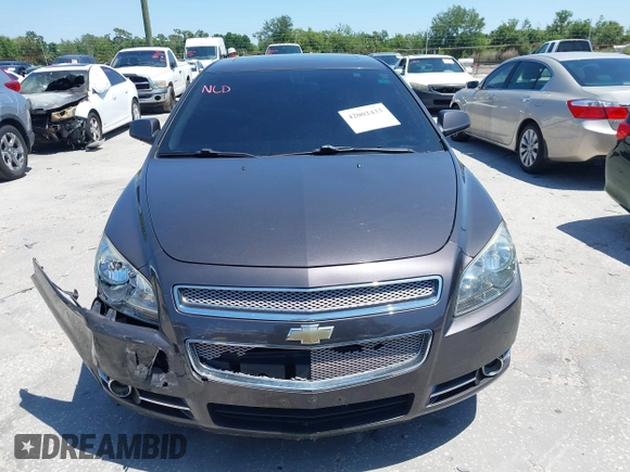 2011 Chevrolet Malibu LTZ with VIN 1G1ZE5E75BF184694, listed as a IAAI auction lot 42002433 with 185,724 mi miles and . Bid and sale history available at DreamBid. Image 12.