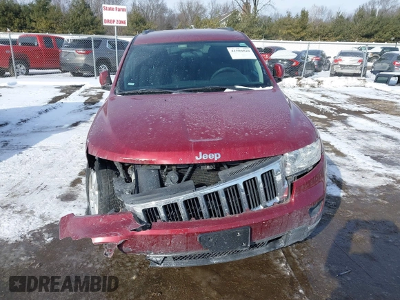 2013 Jeep Grand Cherokee Laredo with VIN 1C4RJFAG4DC572986, listed as a IAAI auction lot 41586820 with 100,899 mi miles. Bid and sale history available at carsss.com. Image 13.