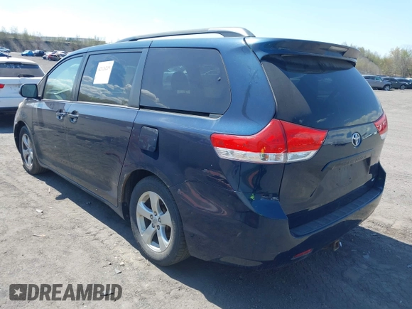 2012 Toyota Sienna LE AAS with VIN 5TDKK3DC7CS274726, listed as a IAAI auction lot 42126219 with 184,158 mi miles. Bid and sale history available at carsss.com. Image 3.