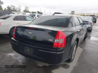 2010 Chrysler 300 Touring with VIN 2C3CA5CV6AH250021, listed as a IAAI auction lot 41811445 with 122,209 mi miles. Bid and sale history available at carsss.com. Image 4.