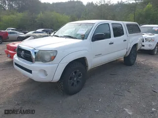 2011 Toyota Tacoma with VIN 3TMLU4EN3BM077216, listed as a IAAI auction lot 41916370 with 159,554 mi miles. Bid and sale history available at carsss.com. Image 17.