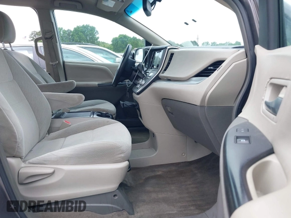2015 Toyota Sienna LE AAS with VIN 5TDKK3DC5FS610247, listed as a IAAI auction lot 42033460 with 260,962 mi miles and . Bid and sale history available at DreamBid. Image 5.