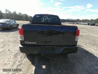 2012 Toyota Tundra 2WD Truck with VIN 5TFRM5F11CX041032, listed as a IAAI auction lot 41744471 with 207,330 mi miles. Bid and sale history available at carsss.com. Image 16.