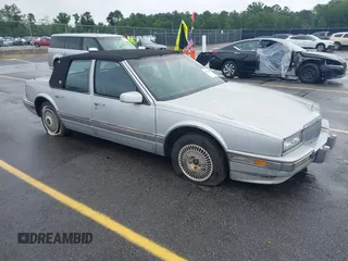 1991 Cadillac Seville z VIN 1G6KS53B2MU813855, wystawiony jako IAAI lot #42425470 z przebiegiem 168 194 mil mil oraz . Historia ofert i sprzedaży dostępna na DreamBid. Obrazek 1.