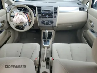 2009 Nissan Versa S with VIN 3N1BC11E19L433572, listed as a Copart auction lot 54084215 with 144,178 mi miles and Salvage title. Bid and sale history available at DreamBid. Image 8.