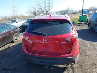 2016 Mazda CX-5 Touring with VIN JM3KE4CY0G0901356, listed as a IAAI auction lot 41641742 with 96,950 mi miles. Bid and sale history available at carsss.com. Image 16.