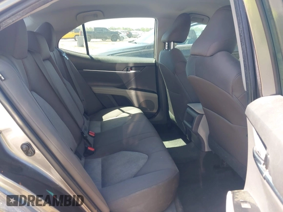 2019 Toyota Camry LE z VIN 4T1B11HK4KU797720, wystawiony jako IAAI lot #42053830 z przebiegiem 102 558 mil mil oraz . Historia ofert i sprzedaży dostępna na DreamBid. Obrazek 8.