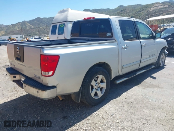 2007 Nissan Titan XE with VIN 1N6AA07A87N214499, listed as a IAAI auction lot 41965882 with 140,693 mi miles and . Bid and sale history available at DreamBid. Image 4.