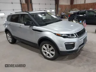 2016 Land Rover Range Rover Evoque SE z VIN SALVP2BG9GH157831, wystawiony jako IAAI lot #42327561 z przebiegiem 60 965 mil mil oraz . Historia ofert i sprzedaży dostępna na DreamBid. Obrazek 1.