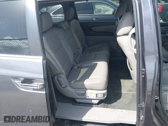 2016 Honda Odyssey EX-L with VIN 5FNRL5H67GB081580, listed as a IAAI auction lot 41935281 with 201,000 mi miles and . Bid and sale history available at DreamBid. Image 7.