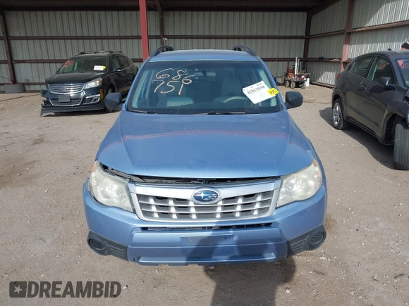 2011 Subaru Forester X with VIN JF2SHBBC8BH777617, listed as a IAAI auction lot 42011038 with 82,059 mi miles and . Bid and sale history available at DreamBid. Image 12.