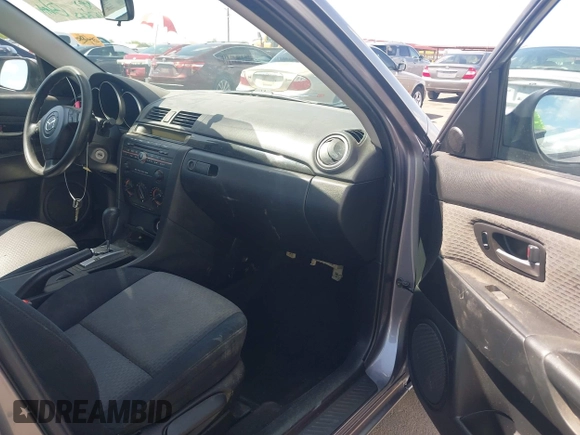 2006 Mazda Mazda3 i with VIN JM1BK12G161465537, listed as a IAAI auction lot 42074144 with 167,823 mi miles. Bid and sale history available at carsss.com. Image 5.