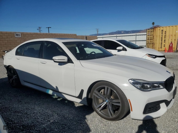 2019 BMW 7 Series 750i with VIN WBA7F0C53KGM25787, listed as a Copart auction lot 88172835 with 71,267 mi miles and Salvage Title. Bid and sale history available at carsss.com. Image 4.
