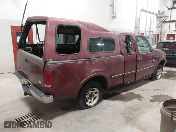 1997 Ford F-150 XL with VIN 1FTEX18L3VKC91921, listed as a IAAI auction lot 41820453 with 210,553 mi miles. Bid and sale history available at carsss.com. Image 4.