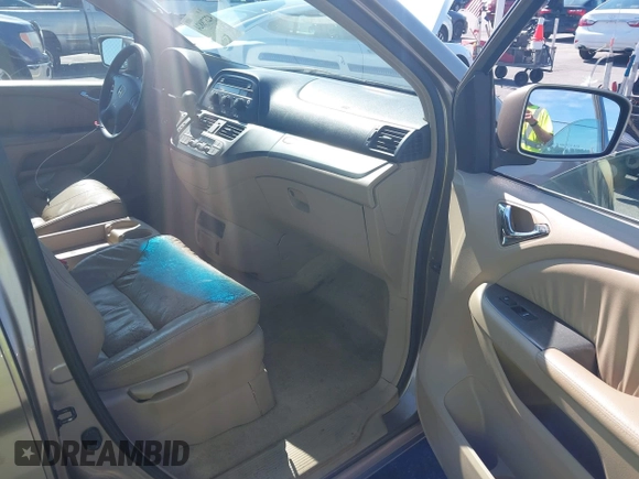 2005 Honda Odyssey EX-L z VIN 5FNRL38735B111376, wystawiony jako IAAI lot #42378824 z przebiegiem 191 632 mil mil oraz . Historia ofert i sprzedaży dostępna na DreamBid. Obrazek 5.