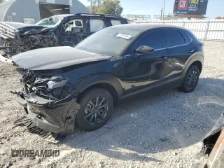 2022 Mazda CX-30 S with VIN 3MVDMBAL9NM415122, listed as a Copart auction lot 77567354 with 64,323 mi miles and Salvage Title. Bid and sale history available at carsss.com. Image 1.