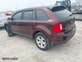 2012 Ford Edge SEL with VIN 2FMDK3JC1CBA45260, listed as a IAAI auction lot 42024673 with 183,328 mi miles. Bid and sale history available at carsss.com. Image 3.