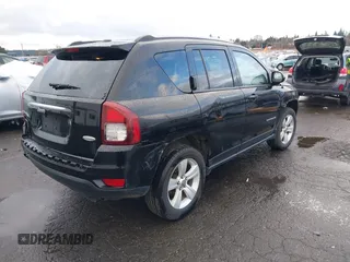 2016 Jeep Compass High Altitude Edition with VIN 1C4NJDEB6GD674564, listed as a IAAI auction lot 41783578 with 98,599 mi miles. Bid and sale history available at carsss.com. Image 4.