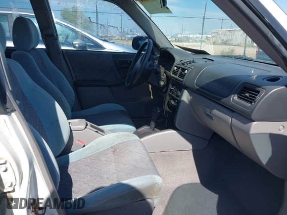 1999 Subaru Forester L with VIN JF1SF6353XH741228, listed as a IAAI auction lot 39377894 with 156,243 mi miles. Bid and sale history available at carsss.com. Image 5.