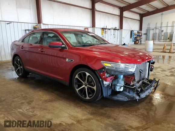 2015 Ford Taurus SEL with VIN 1FAHP2E83FG143653, listed as a Copart auction lot 59280645 with 77,048 mi miles and Salvage title. Bid and sale history available at DreamBid. Image 4.