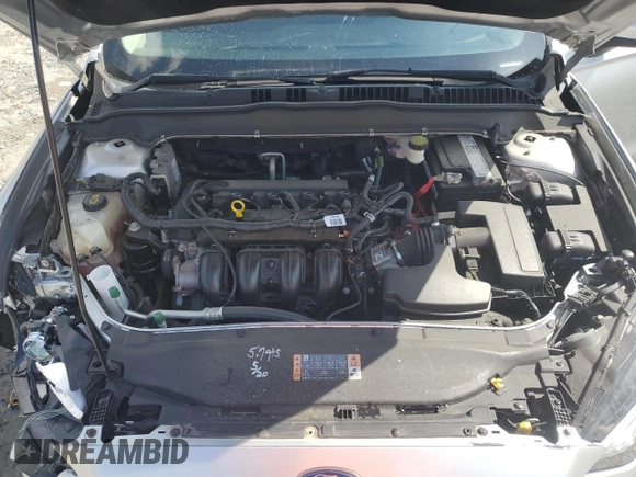 2017 Ford Fusion SE z VIN 3FA6P0H74HR164747, wystawiony jako Copart lot #56139855 z przebiegiem 105 769 mil mil oraz Szkoda całkowita • Salvage title. Historia ofert i sprzedaży dostępna na DreamBid. Obrazek 11.