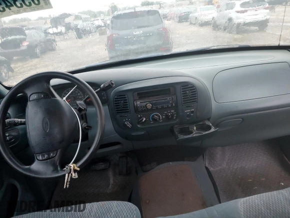 1998 Ford F-150 with VIN 1FTZF18W8WKA89592, listed as a Copart auction lot 65345104 with 166,758 mi miles and Salvage title. Bid and sale history available at DreamBid. Image 8.