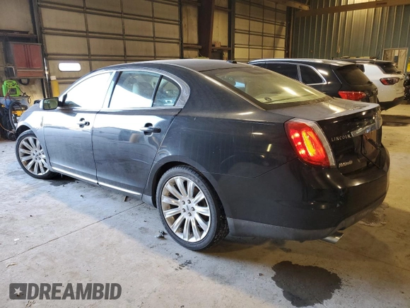 2012 Lincoln MKS with VIN 1LNHL9DR1CG806704, listed as a Copart auction lot 87666765 with 111,933 mi miles and Salvage Title. Bid and sale history available at carsss.com. Image 2.