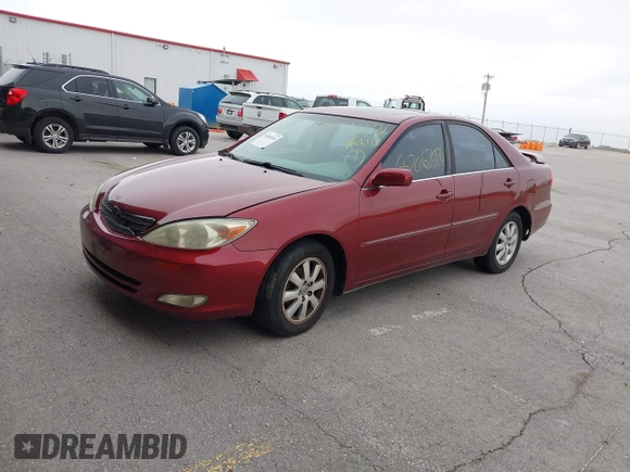 2003 Toyota Camry LE with VIN 4T1BE30K03U227243, listed as a IAAI auction lot 42063924 with 177,323 mi miles and . Bid and sale history available at DreamBid. Image 2.