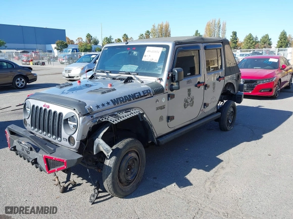 2015 Jeep Wrangler Unlimited Sport with VIN 1C4BJWDG7FL587014, listed as a IAAI auction lot 40641034 with 81,045 mi miles. Bid and sale history available at carsss.com. Image 2.