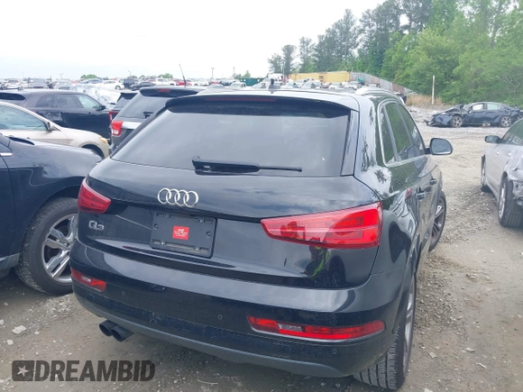 2016 Audi Q3 Premium Plus with VIN WA1BFCFSXGR022587, listed as a IAAI auction lot 42133288 with 141,609 mi miles. Bid and sale history available at carsss.com. Image 4.