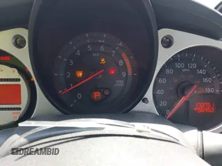 2012 Nissan 370Z z VIN JN1AZ4EH1CM564630, wystawiony jako IAAI lot #42177880 z przebiegiem 173 751 mil mil oraz . Historia ofert i sprzedaży dostępna na DreamBid. Obrazek 7.