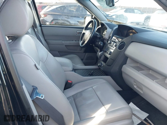 2012 Honda Pilot Touring with VIN 5FNYF4H93CB077057, listed as a IAAI auction lot 41156160 with 139,834 mi miles and . Bid and sale history available at DreamBid. Image 5.