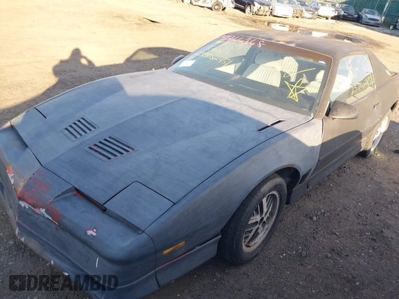 1988 Pontiac Firebird with VIN 1G2FW21F2JL251274, listed as a IAAI auction lot 41766168 with 999,999 mi miles. Bid and sale history available at carsss.com. Image 6.