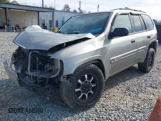 2003 GMC Envoy SLT with VIN 1GKDS13SX32203909, listed as a IAAI auction lot 41457713 with 199,507 mi miles. Bid and sale history available at carsss.com. Image 15.